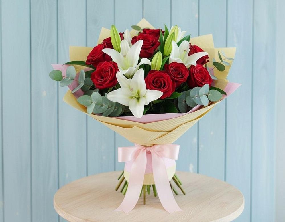 Букет цветов из: Лилии и Розы в Попутная